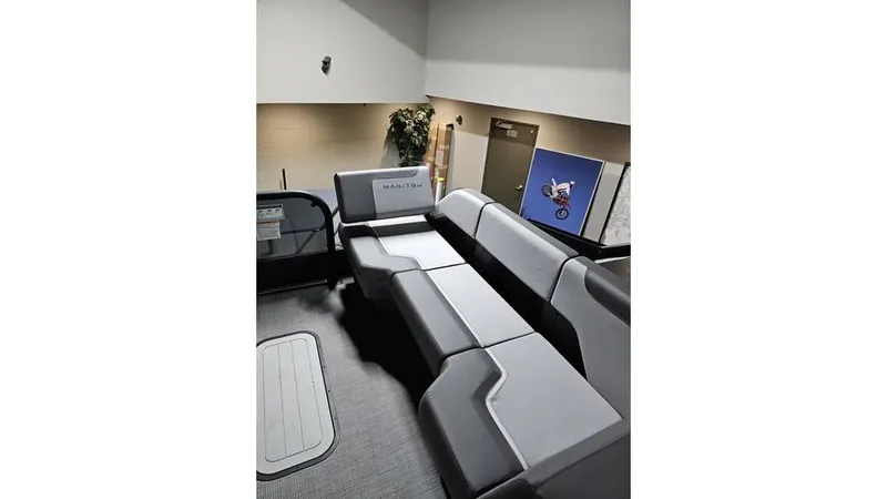 Slide: The Image of 2025 Manitou 20 CRUISE MAX interior with sleek seating and modern design. - 15