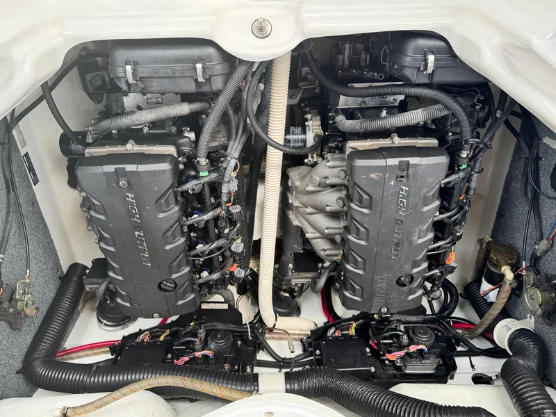 Slide: The Image of 2014 Yamaha Boats 212X engine compartment with dual high-output engines. - 12