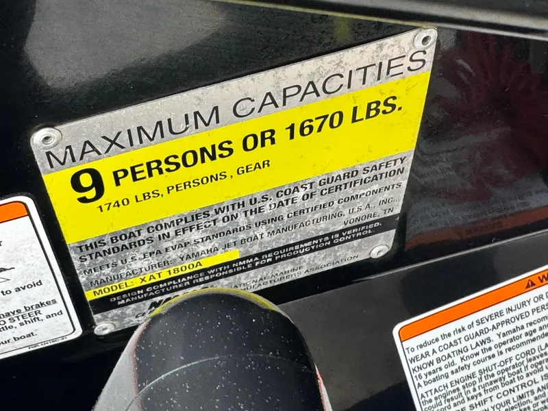 Slide: The Image of Yamaha Boats 2014 212X capacity label, maximum 9 persons or 1670 lbs. - 13