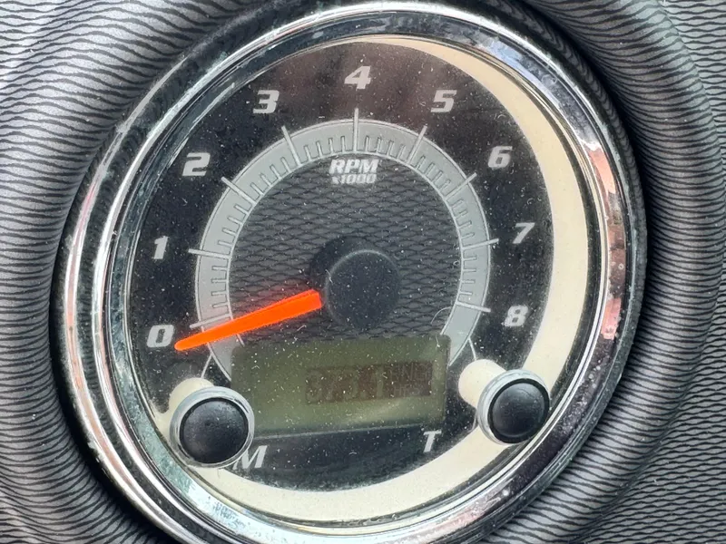 Slide: The Image of Close-up of a Yamaha Boats 212X 2014 tachometer displaying RPM. - 14