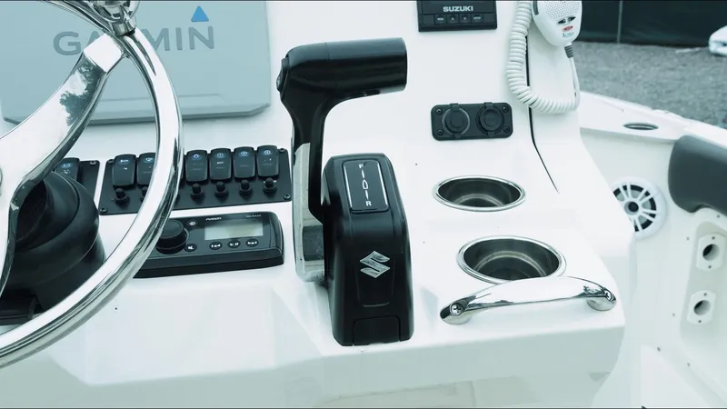 Slide: The Image of Control panel of a 2019 Stingray 206 CC boat with Garmin equipment. - 9