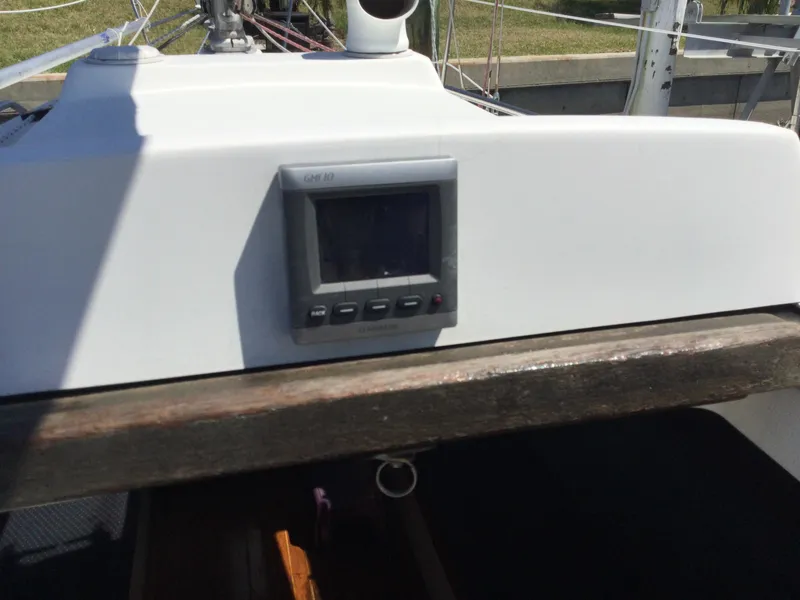 Slide: The Image of 1997 J Boats J/32 sailboat cockpit with navigation display. - 14