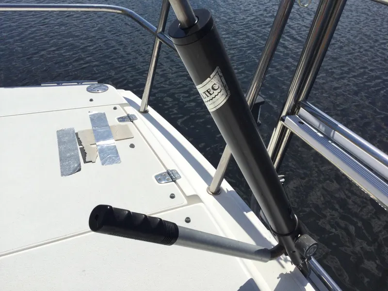 Slide: The Image of J Boats J/32 (1997) deck with steering mechanism and railing, overlooking water. - 21