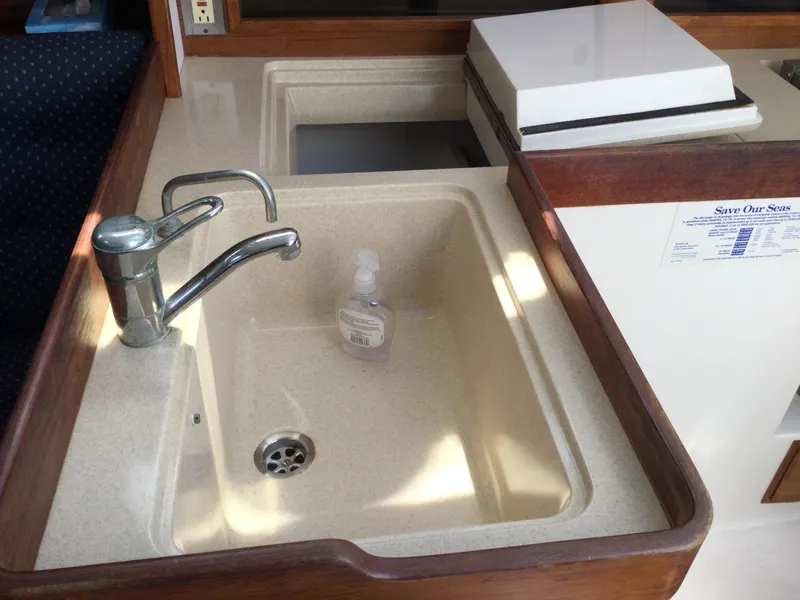 Slide: The Image of Interior sink of 1997 J Boats J/32 yacht with faucet and soap bottle. - 32