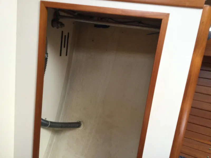 Slide: The Image of Empty storage compartment on a 1997 J Boats J/32 sailboat. - 41