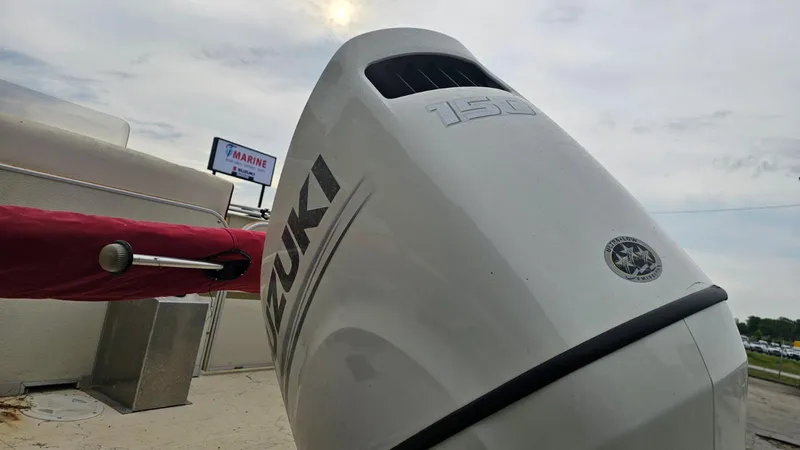 Slide: The Image of Outboard motor on a 2006 Fiesta 26' Fundeck L Sofa RE Deluxe boat. - 3