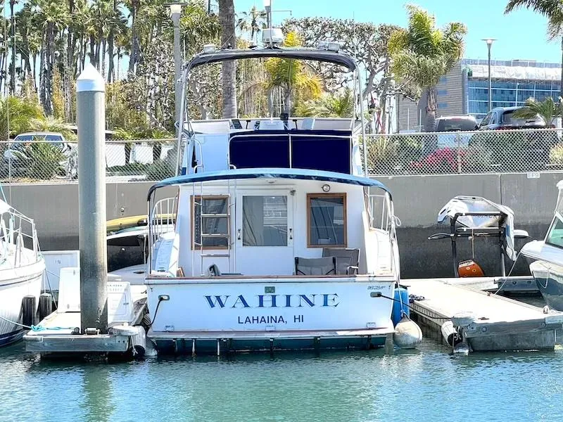 Slide: The Image of 1972 Trojan 36 boat named "Wahine" docked in Lahaina, Hawaii marina. - 3