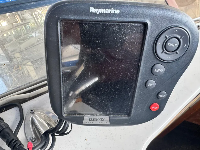 Slide: The Image of Raymarine DS500X fishfinder on 1974 Roberts 30' boat dashboard. - 10
