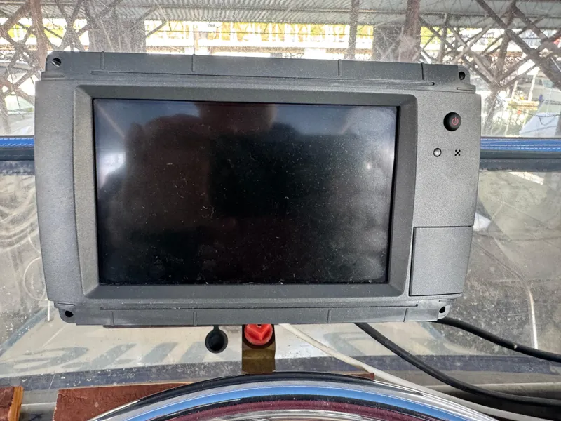 Slide: The Image of Boat dashboard with a black screen, Roberts 30', 1974 model. - 12