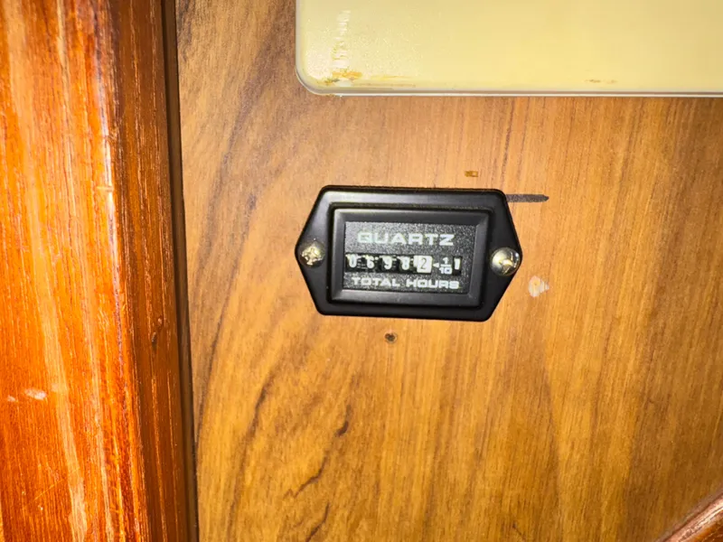 Slide: The Image of Hour meter on 1974 Roberts 30' boat, displaying total engine hours. - 32