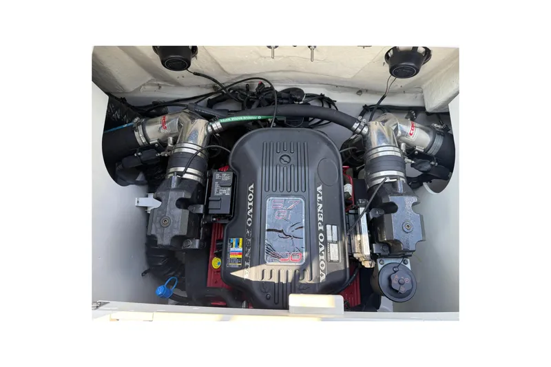 Slide: The Image of 2009 Four Winns SL222 boat engine, featuring a Volvo Penta motor. - 5