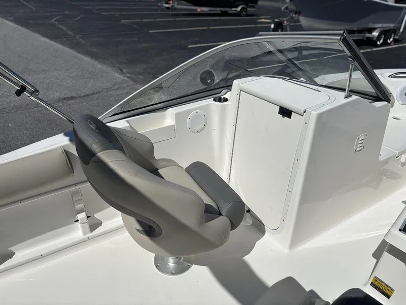 Slide: The Image of 2025 Key West 203 DFS boat interior with seating and console, featuring modern design elements. - 13