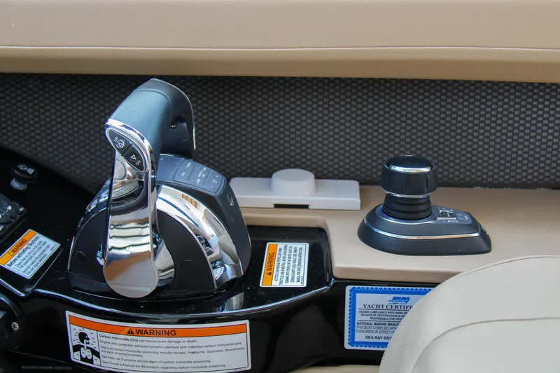 Slide: The Image of Control panel of a 2019 Sea Ray SLX 400 boat with throttle and joystick. - 10