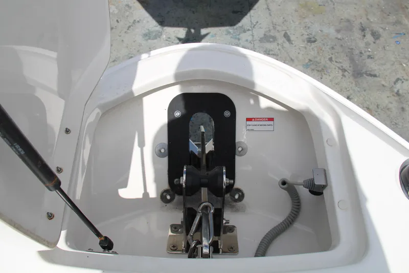 Slide: The Image of Anchor compartment of 2019 Sea Ray SLX 400 boat, featuring hydraulic support and wiring. - 29