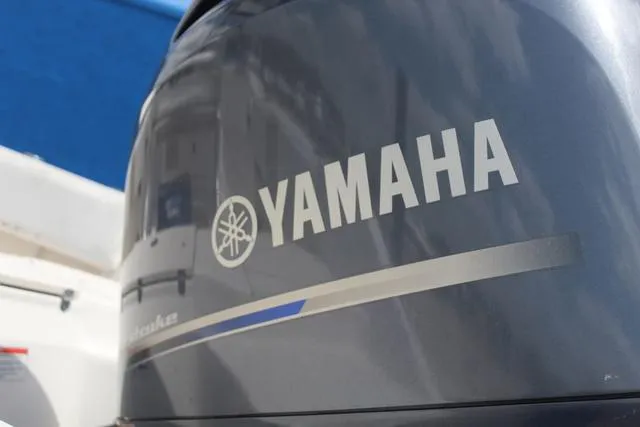 Slide: The Image of Yamaha outboard motor on 2018 Robalo R180 boat, close-up view. - 11