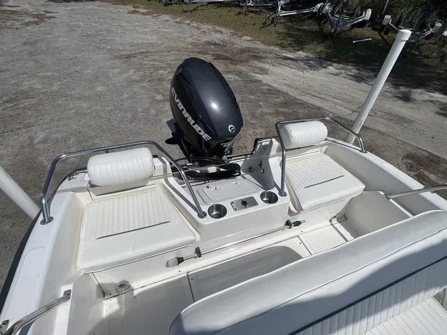 Slide: The Image of 1999 Boston Whaler 160 Dauntless boat with Evinrude outboard motor, rear seating view. - 11