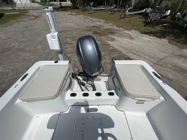 Slide: The Image of 2017 Sportsman 17' Island Reef boat with outboard motor, viewed from the rear deck. - 10