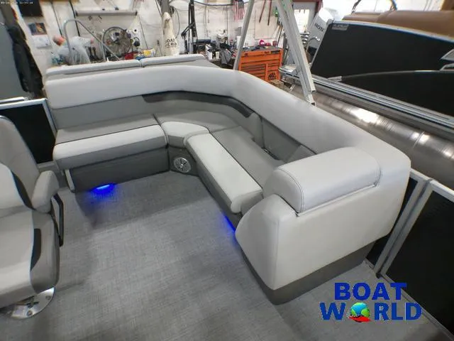 Slide: The Image of 2025 Princecraft Vectra 21 Cruise Lounge interior with modern seating and ambient lighting. - 10