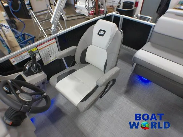 Slide: The Image of 2025 Princecraft Vectra 21 Cruise Lounge interior with steering wheel and seating. - 12
