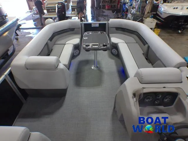 Slide: The Image of 2025 Princecraft Vectra 21 Cruise Lounge interior with gray seating and central table. - 26