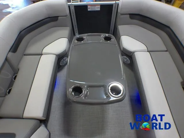 Slide: The Image of 2025 Princecraft Vectra 21 Cruise Lounge interior with sleek seating and modern table design. - 27