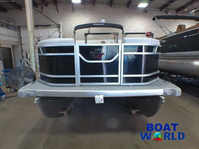 Slide: The Image of 2025 Princecraft Vectra 21 Cruise Lounge pontoon boat in showroom, front view. - 32