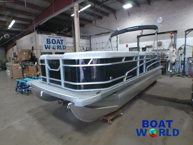 Slide: The Image of 2025 Princecraft Vectra 21 Cruise Lounge pontoon boat in showroom, featuring Mercury 4-Stroke EFI. - 33