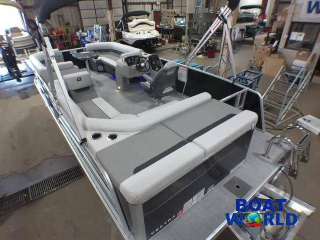 Slide: The Image of 2025 Princecraft Vectra 21 Cruise Lounge with Mercury 4-Stroke EFI in showroom setting. - 5