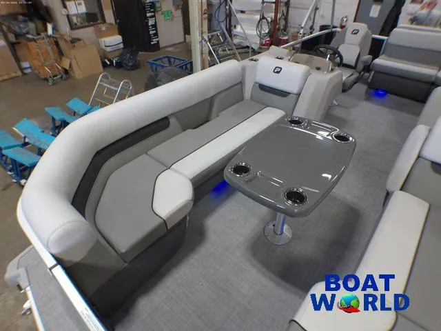 Slide: The Image of 2025 Princecraft Vectra 21 Cruise Lounge interior with seating and table, showcased at Boat World. - 8