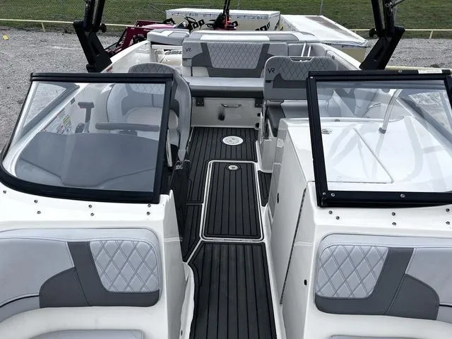 Slide: The Image of 2021 Bayliner VR6 Bowrider interior with sleek seating and modern design. - 13
