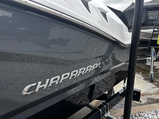 Slide: The Image of 2018 Chaparral 21 H2O Sport I/O boat, close-up of sleek hull design. - 6