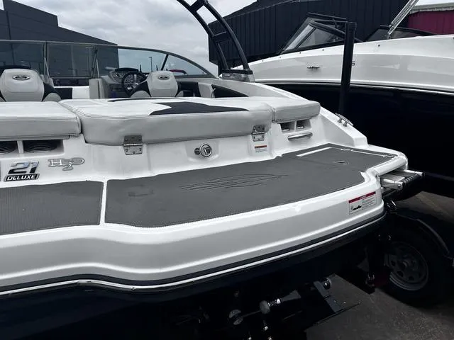 Slide: The Image of 2018 Chaparral 21 H2O Sport I/O boat, rear view with seating and swim platform. - 7