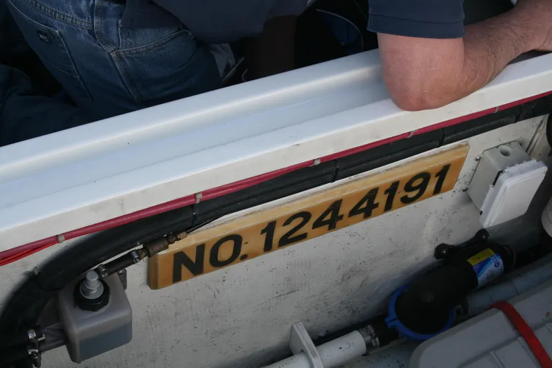 Slide: The Image of Ocean Sport Roamer 30' boat, 2011 model, with registration number 1244191 visible. - 20