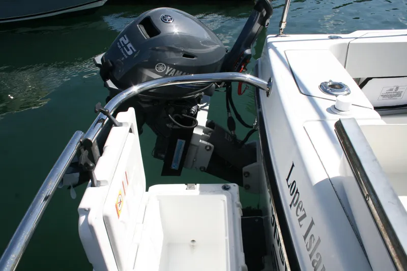 Slide: The Image of Ocean Sport Roamer 30' boat with Yamaha outboard motor, 2011 model, docked at Lopez Island. - 21