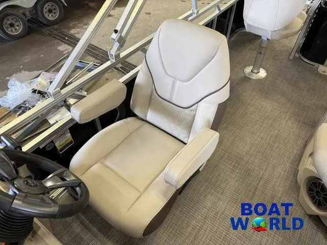 Slide: The Image of Luxurious captain's chair in 2025 Tahoe Sport 2185 Quad Fish boat interior. - 16