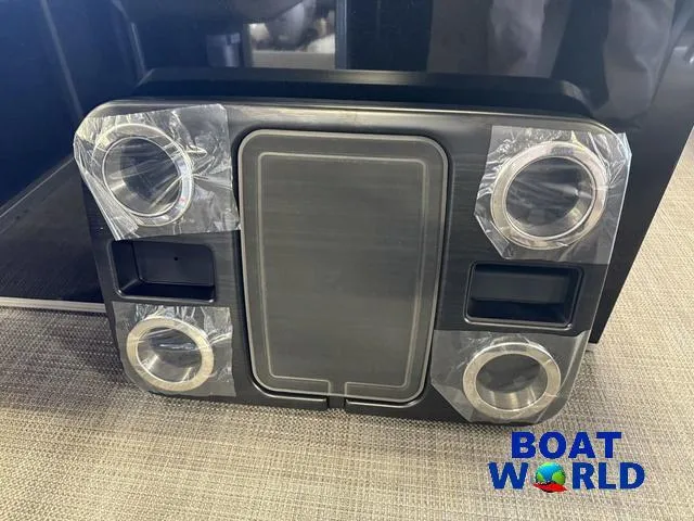 Slide: The Image of Cup holder panel on 2025 Tahoe Sport 2185 Quad Fish boat, displayed at Boat World. - 25