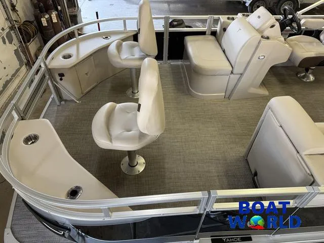 Slide: The Image of 2025 Tahoe Sport 2185 Quad Fish boat interior with seating and console, showcased at Boat World. - 3