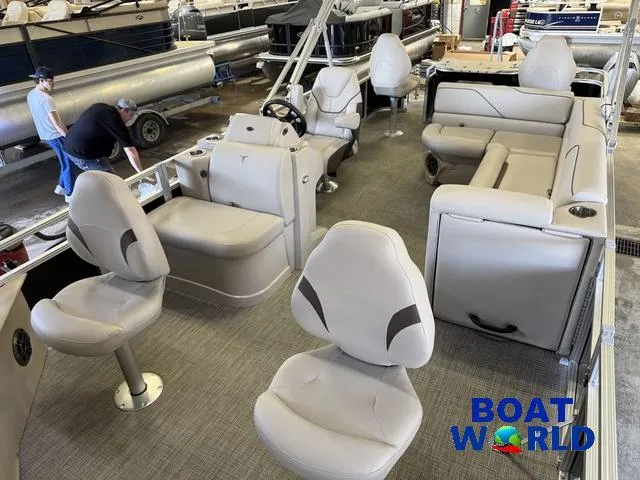 Slide: The Image of 2025 Tahoe Sport 2185 Quad Fish boat interior with seating and steering console. - 34