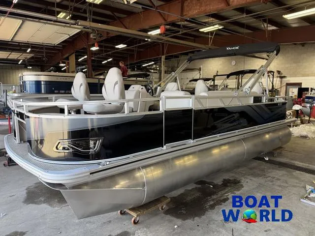 Slide: The Image of 2025 Tahoe Sport 2185 Quad Fish pontoon boat in a showroom. - 39