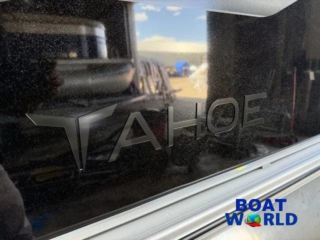 Slide: The Image of 2025 Tahoe Sport 2185 Quad Fish boat logo with Boat World branding. - 45