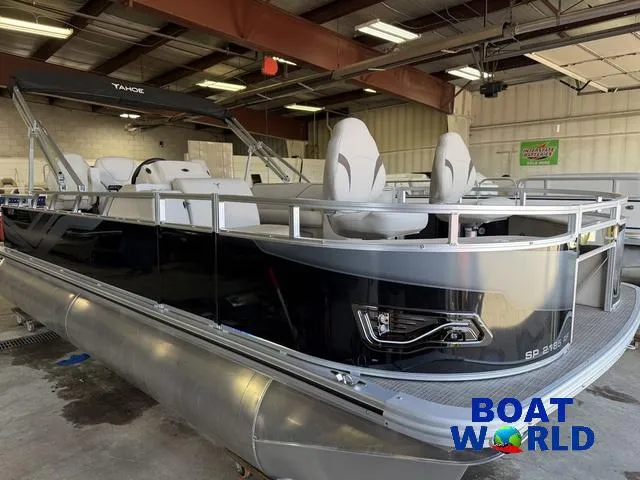 Slide: The Image of 2025 Tahoe Sport 2185 Quad Fish pontoon boat in showroom, featuring Honda 4-Stroke EFI engine. - 46