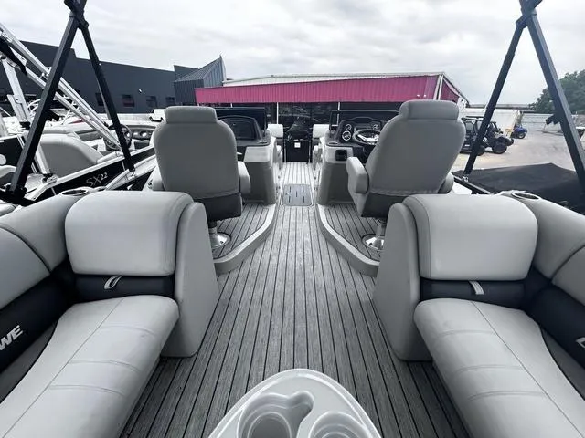 Slide: The Image of 2020 Lowe SS250 WS WindShield boat interior with gray seating and modern dashboard. - 15