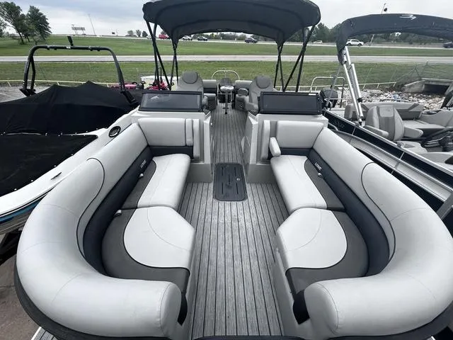 Slide: The Image of 2020 Lowe SS250 WS WindShield pontoon boat with spacious seating and canopy. - 8