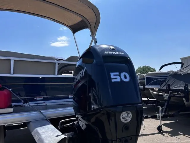 Slide: The Image of 2023 Sun Tracker Bass Buggy® 16 XL Select with Mercury 50 HP engine under a sunny sky. - 3