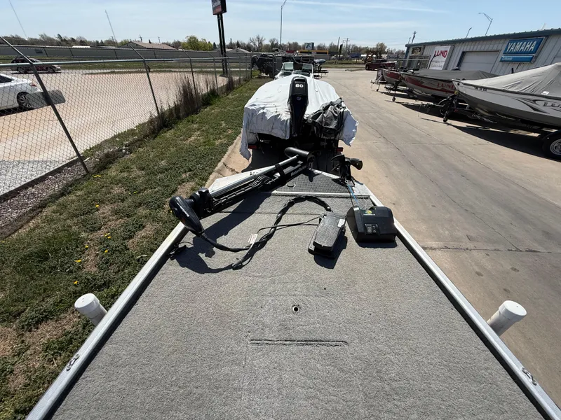 Slide: The Image of 2011 Tracker Pro 165 boat with trolling motor on a sunny day. - 6
