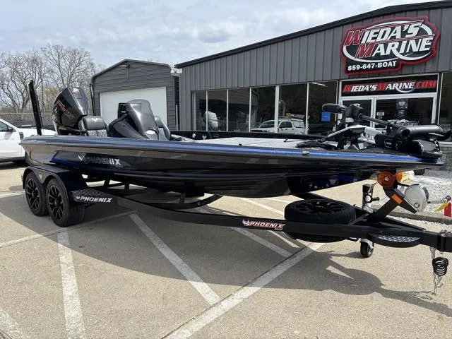 Slide: The Image of 2025 Phoenix 920 Elite boat on trailer at Wieda's Marine dealership. - 8