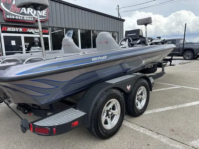 Slide: The Image of 2015 Phoenix 920 PRO XP boat on trailer outside dealership. - 4