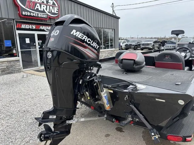 Slide: The Image of 2018 Ranger RT178 boat with Mercury 50 engine at a dealership. - 2