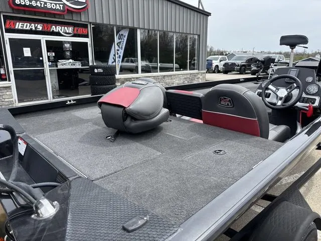Slide: The Image of 2018 Ranger RT178 boat with red and gray seating, displayed at Wieda's Marine dealership. - 3