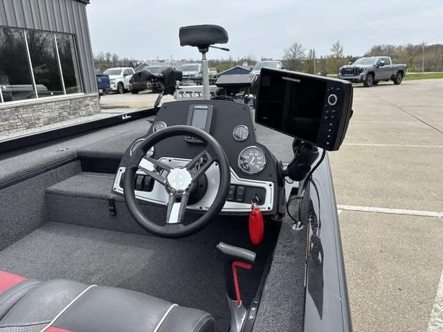 Slide: The Image of 2018 Ranger RT178 boat dashboard with steering wheel and mounted navigation system. - 4
